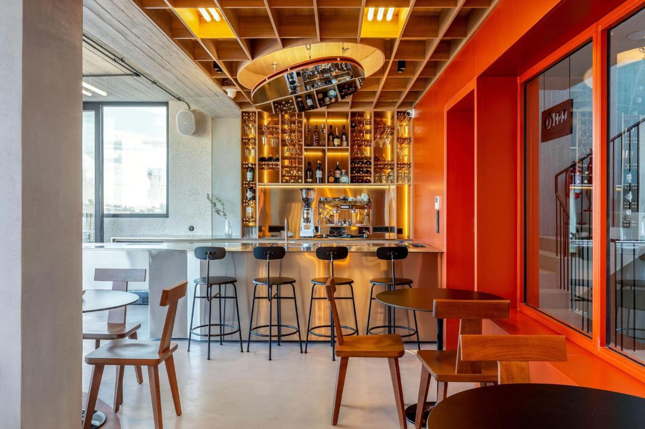 The Newel Psychiko Hotell Aten Exteriör bild The interior of a Starbucks Reserve store in Milan, Italy
