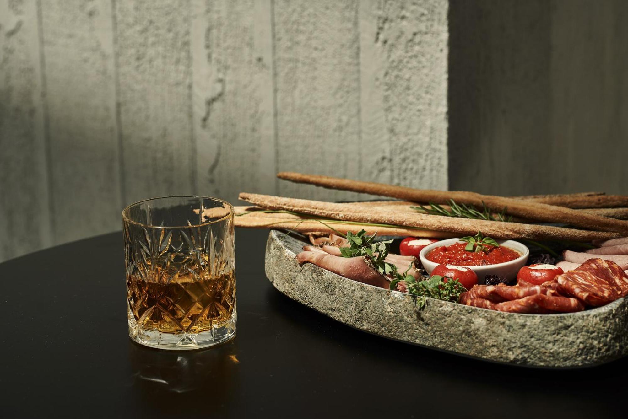 The Newel Psychiko Hotell Aten Exteriör bild A glass of grappa
